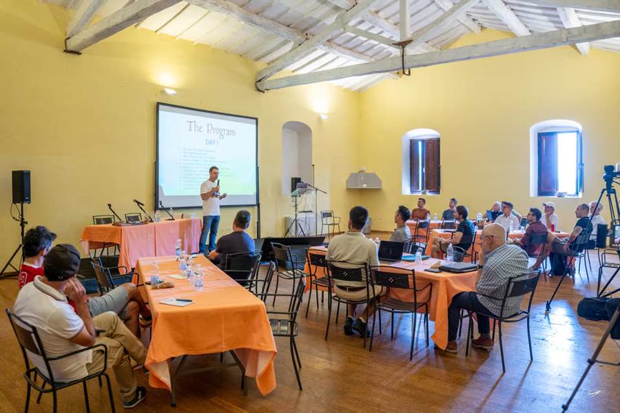 Web3 in Travel Conference 2024, a room of people in a castle in Umbria